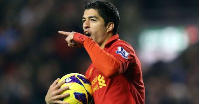 Luis Suarez celebrates claiming Liverpool's second-half equaliser
